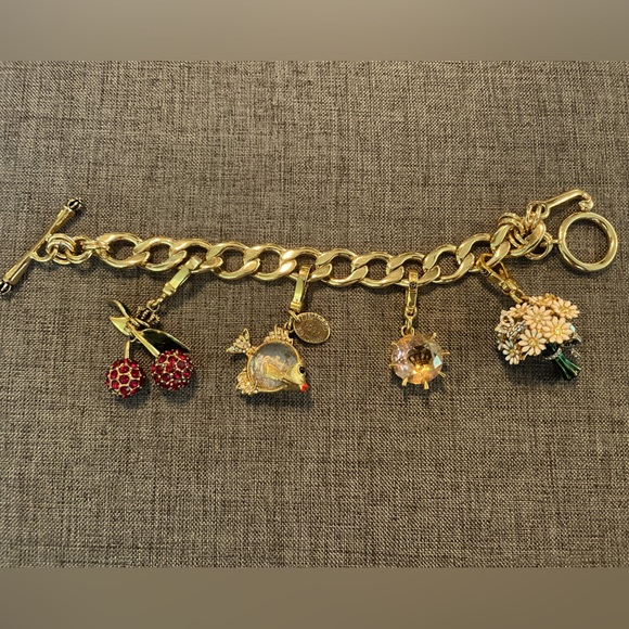 Juicy Couture Collectible Charm Bracelet like new.